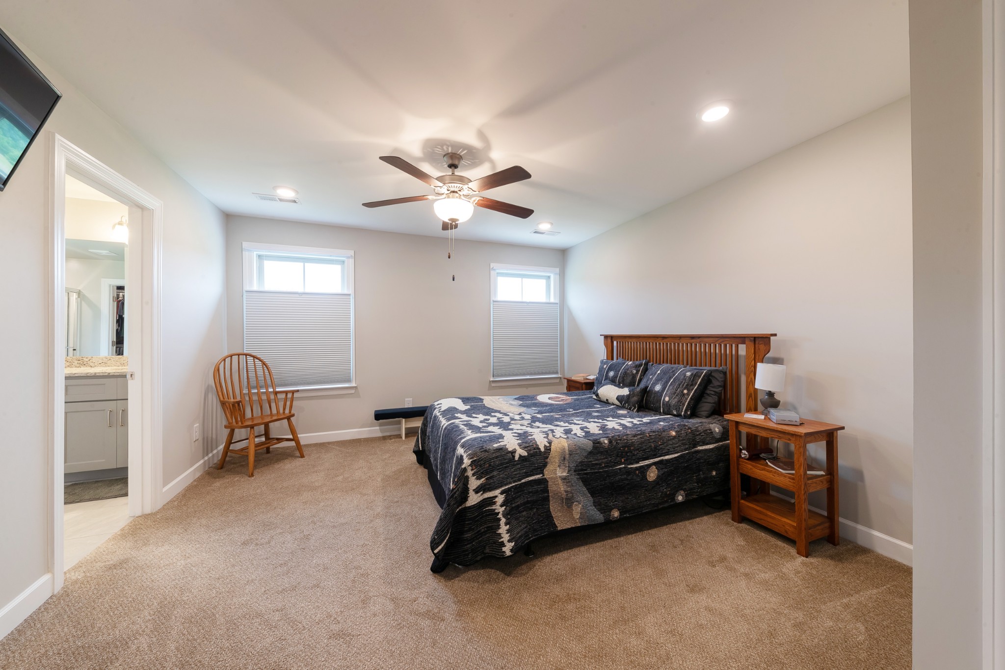 191 Preserve Circle Manchester, TN 37355 - Photo 12 of 25 a bedroom with a bed and a chandelier