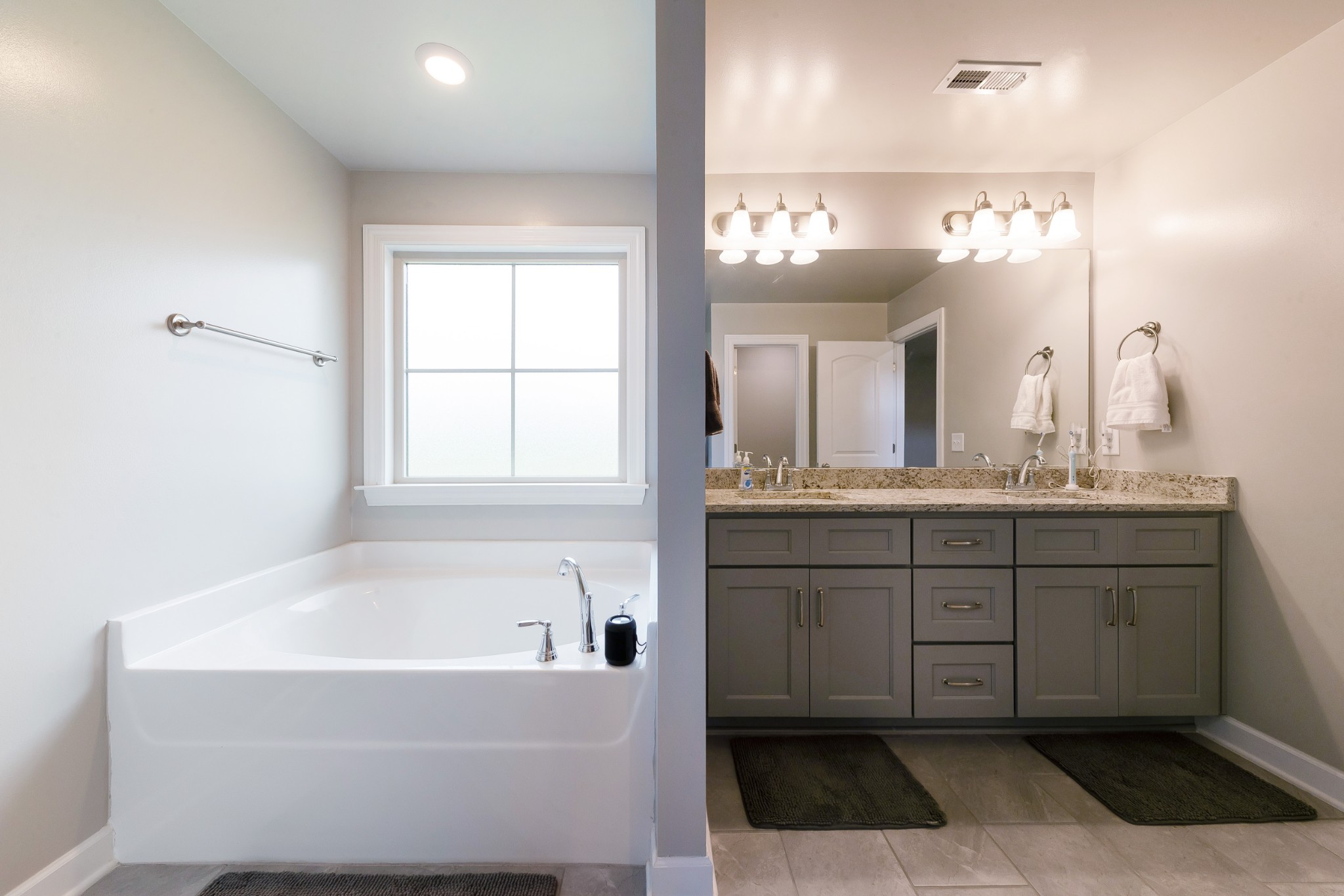 191 Preserve Circle Manchester, TN 37355 - Photo 16 of 25 a bathroom with a tub sink and mirror