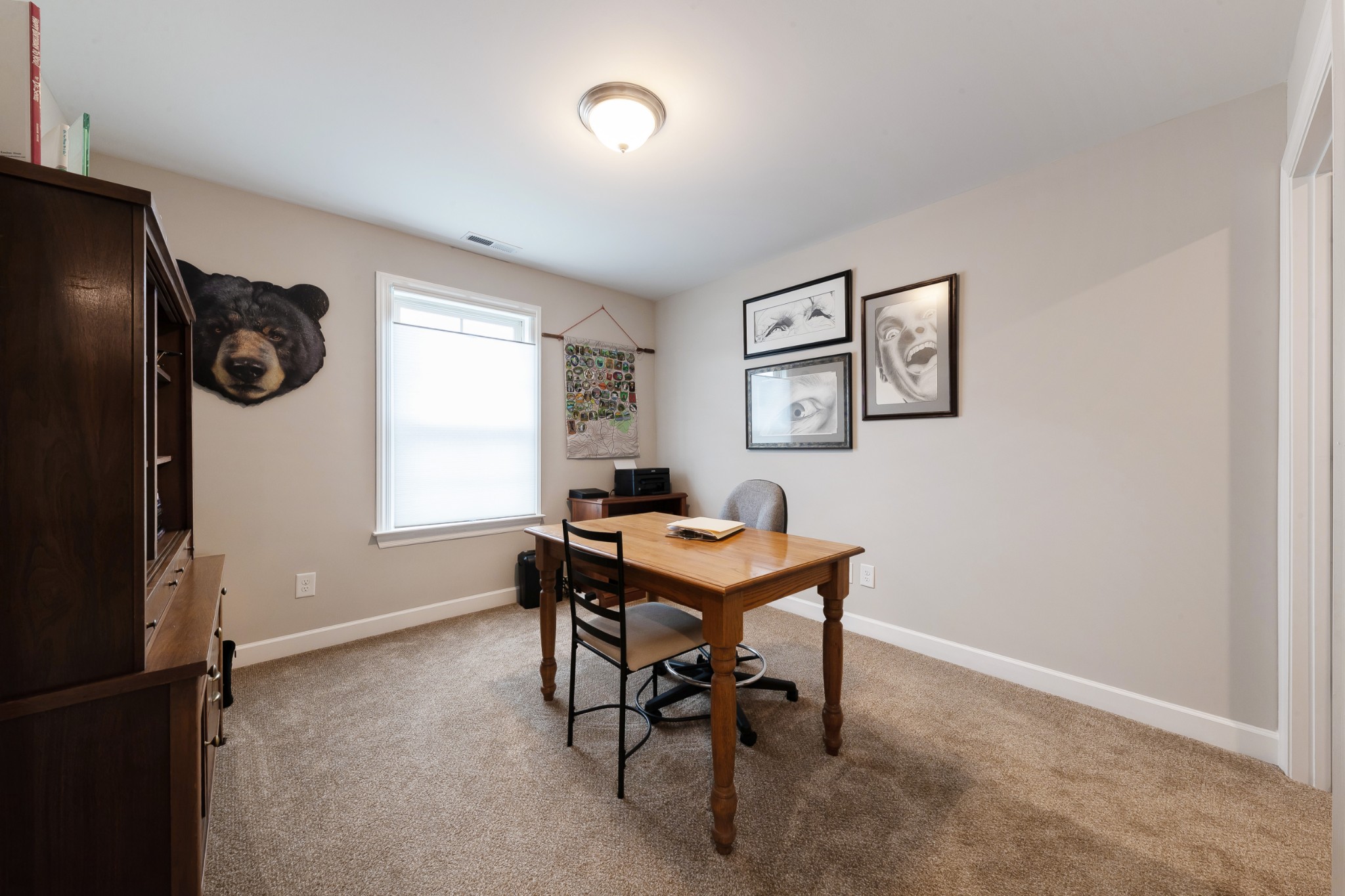 191 Preserve Circle Manchester, TN 37355 - Photo 19 of 25 a view of a workspace with furniture and a window