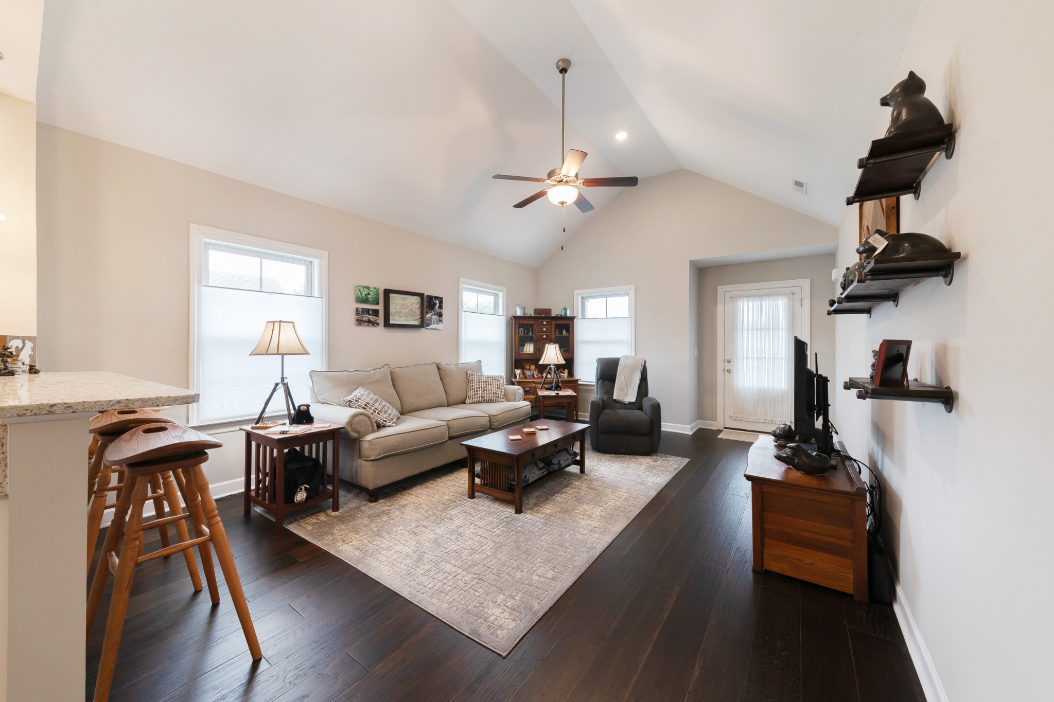 191 Preserve Circle Manchester, TN 37355 - Photo 4 of 25 a living room with furniture a large window and a chandelier