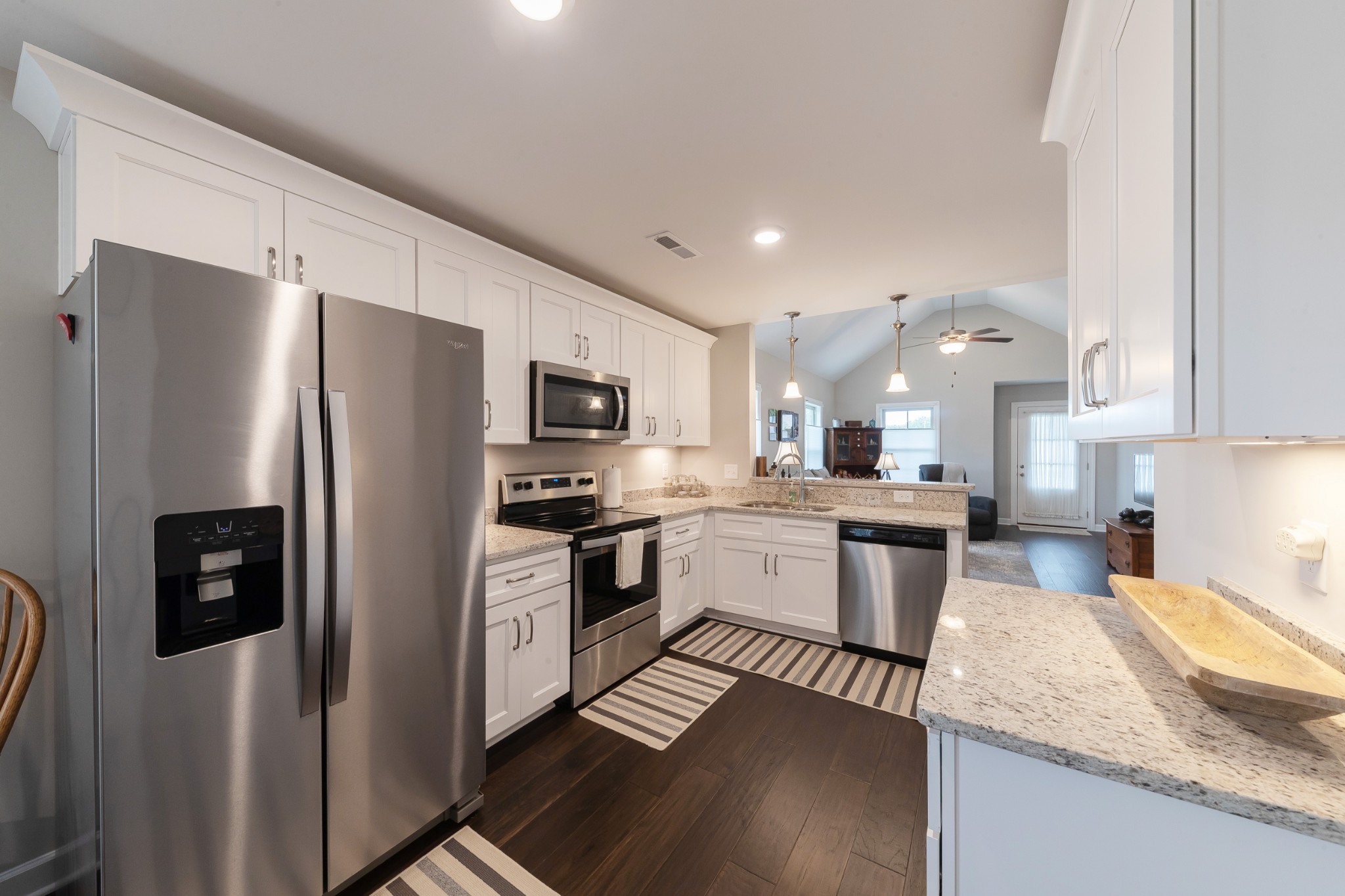 191 Preserve Circle Manchester, TN 37355 - Photo 7 of 25 a kitchen with stainless steel appliances granite countertop a refrigerator stove microwave and sink