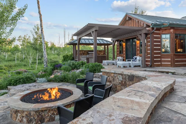 swimming pool view with a seating space