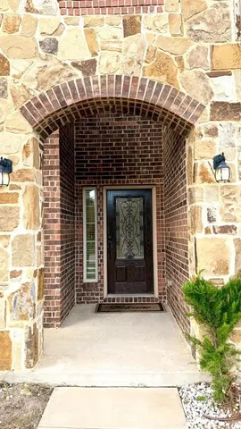 a front view of a building with a entrance