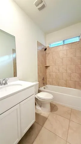 a bathroom with a sink a bathtub and a toilet
