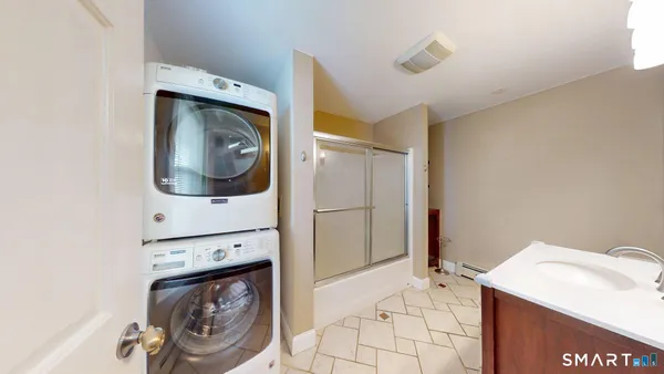 a utility room with dryer and washer