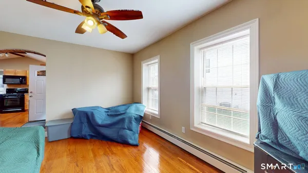 a living room with furniture and a window
