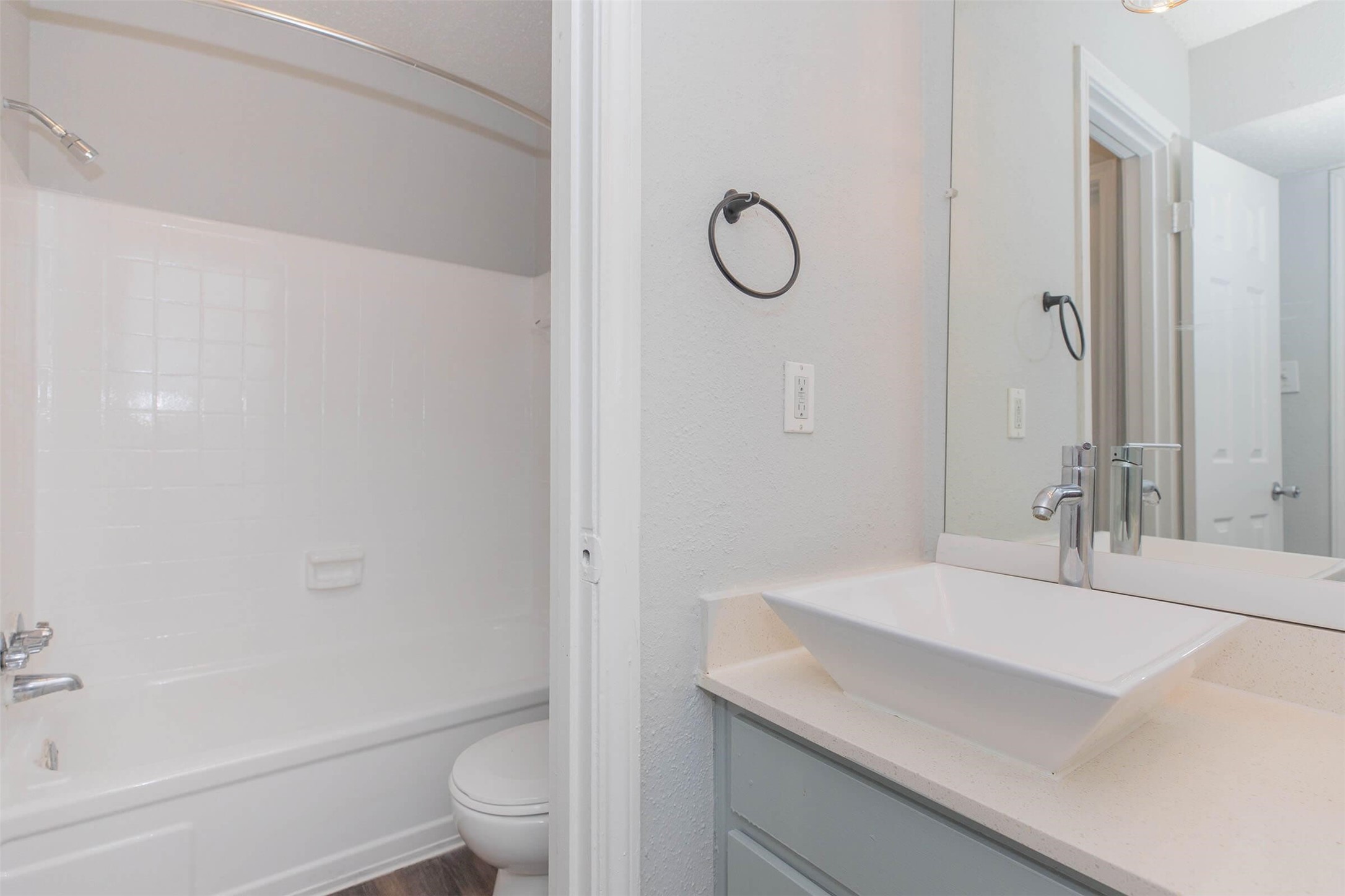 3001 Hillcroft Street, Unit G0504 Houston, TX 77057 - Photo 24 of 50 a bathroom with a sink a toilet and shower