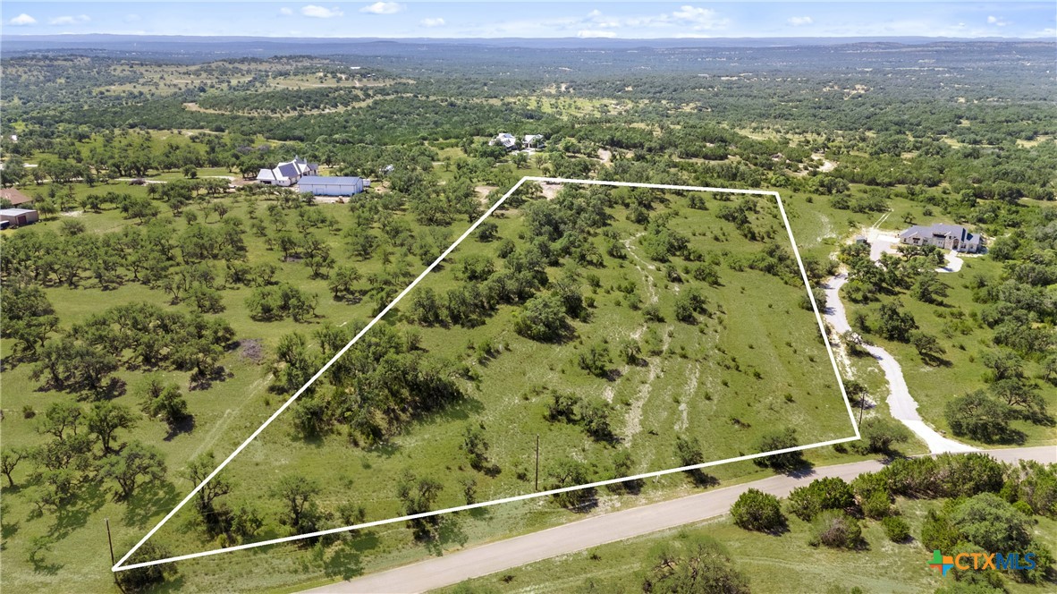 820 Stone Ridge Mountain Drive Round Mountain, TX 78663 - Photo 7 of 32 a view of a city