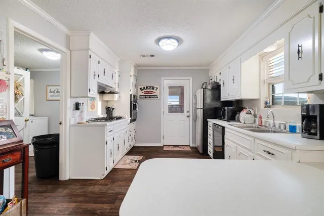 a bedroom with a bed and dresser
