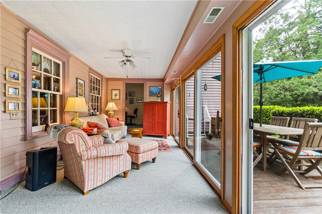 1096 West Lake Road Jerusalem, NY 14418 - Photo 21 of 49 3 season enclosed porch with a wall of glass