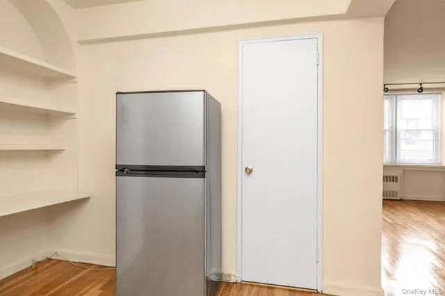 a view of walk in closet with window