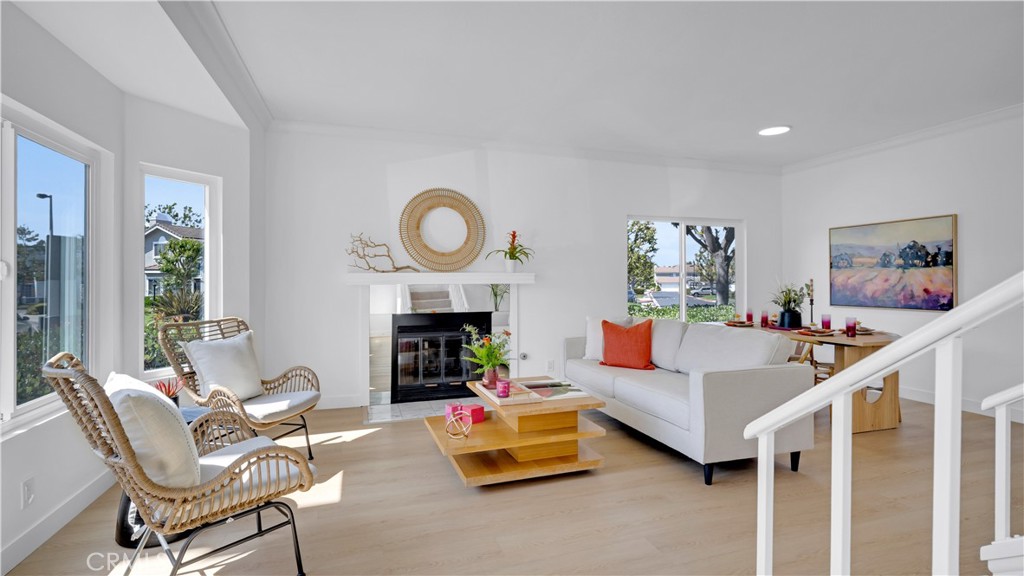336 Fallingstar Irvine, CA 92614 - Photo 5 of 73 a living room with furniture and a fireplace