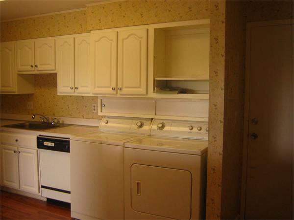 402 Paradise Road, Unit 3B Swampscott, MA 01907 - Photo 5 of 23 a utility room with dryer and washer