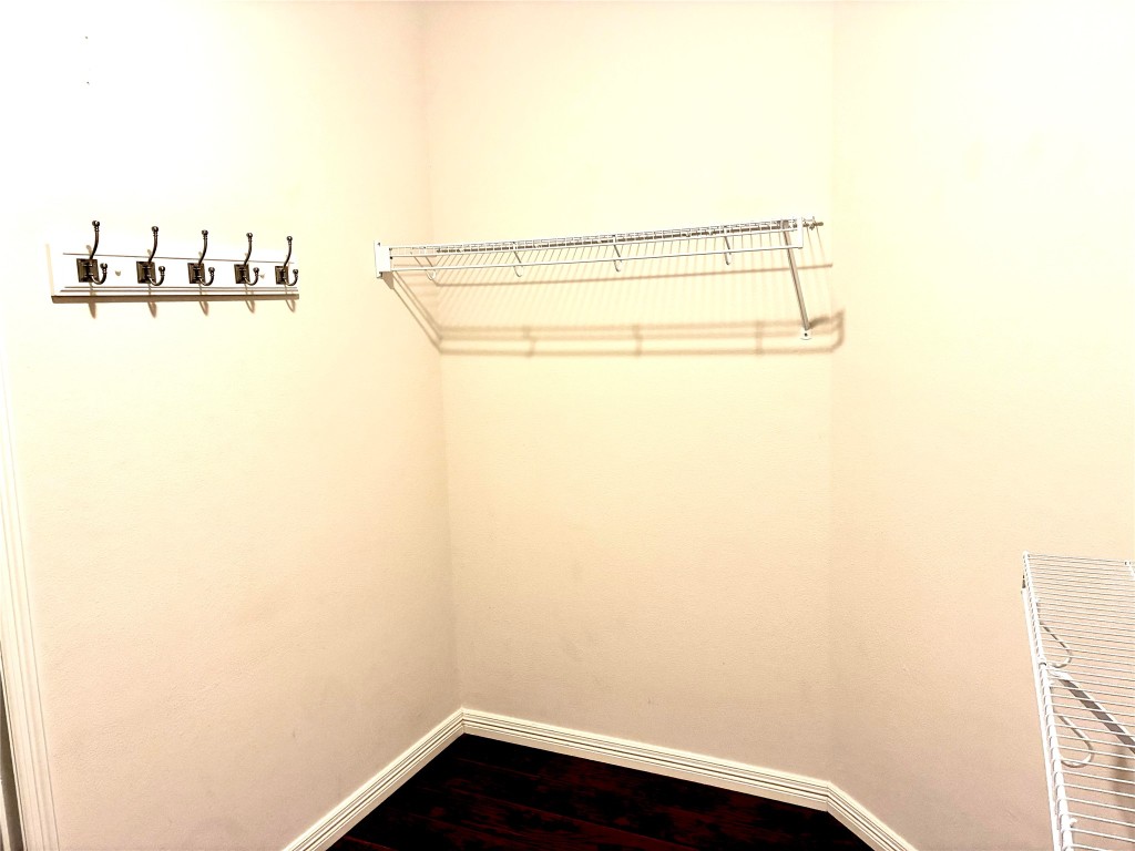 20518 Bonds Creek Lane Spring, TX 77388 - Photo 19 of 30 a view of a hardwood floor and an empty room