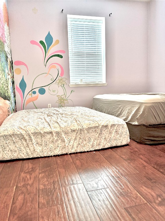 20518 Bonds Creek Lane Spring, TX 77388 - Photo 29 of 30 a bedroom with a bed and a window