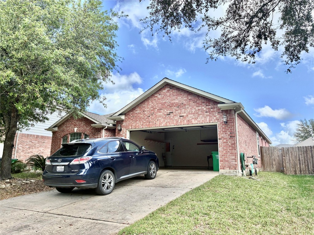 20518 Bonds Creek Lane Spring, TX 77388 - Photo 3 of 30 a view of a car in front of house