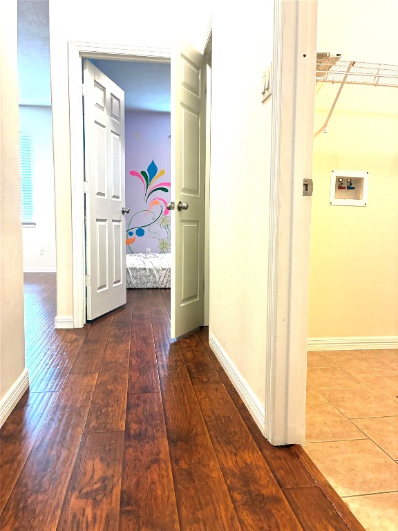20518 Bonds Creek Lane Spring, TX 77388 - Photo 9 of 30 a view of a hallway view with wooden floor and staircase