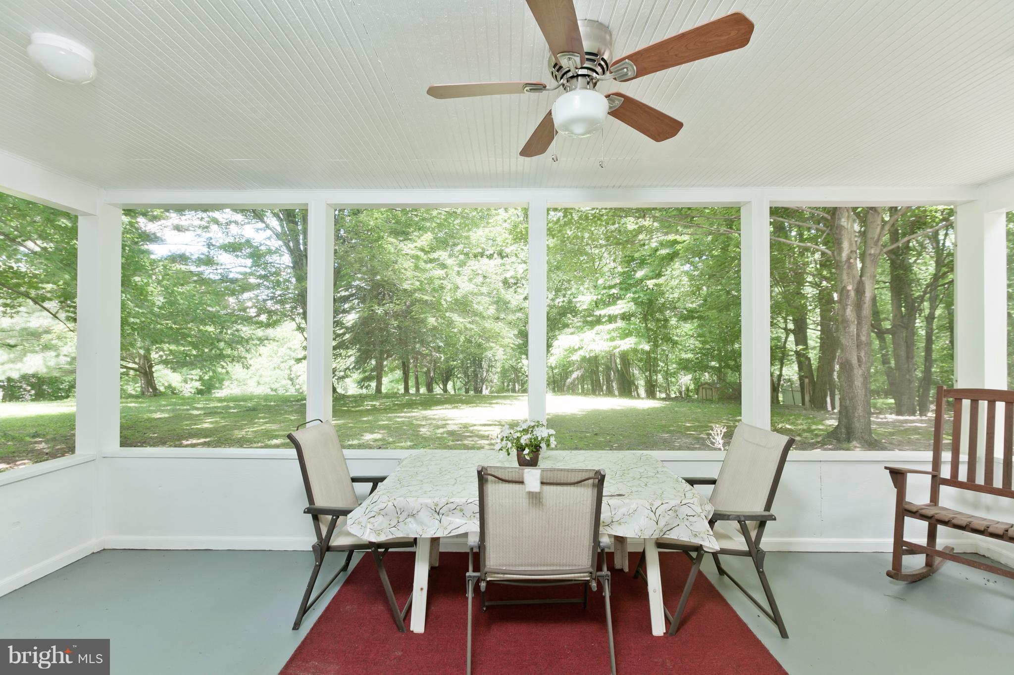 10117 Clearspring Road Damascus, MD 20872 - Photo 23 of 30 Screened porch overlooking amazing yard