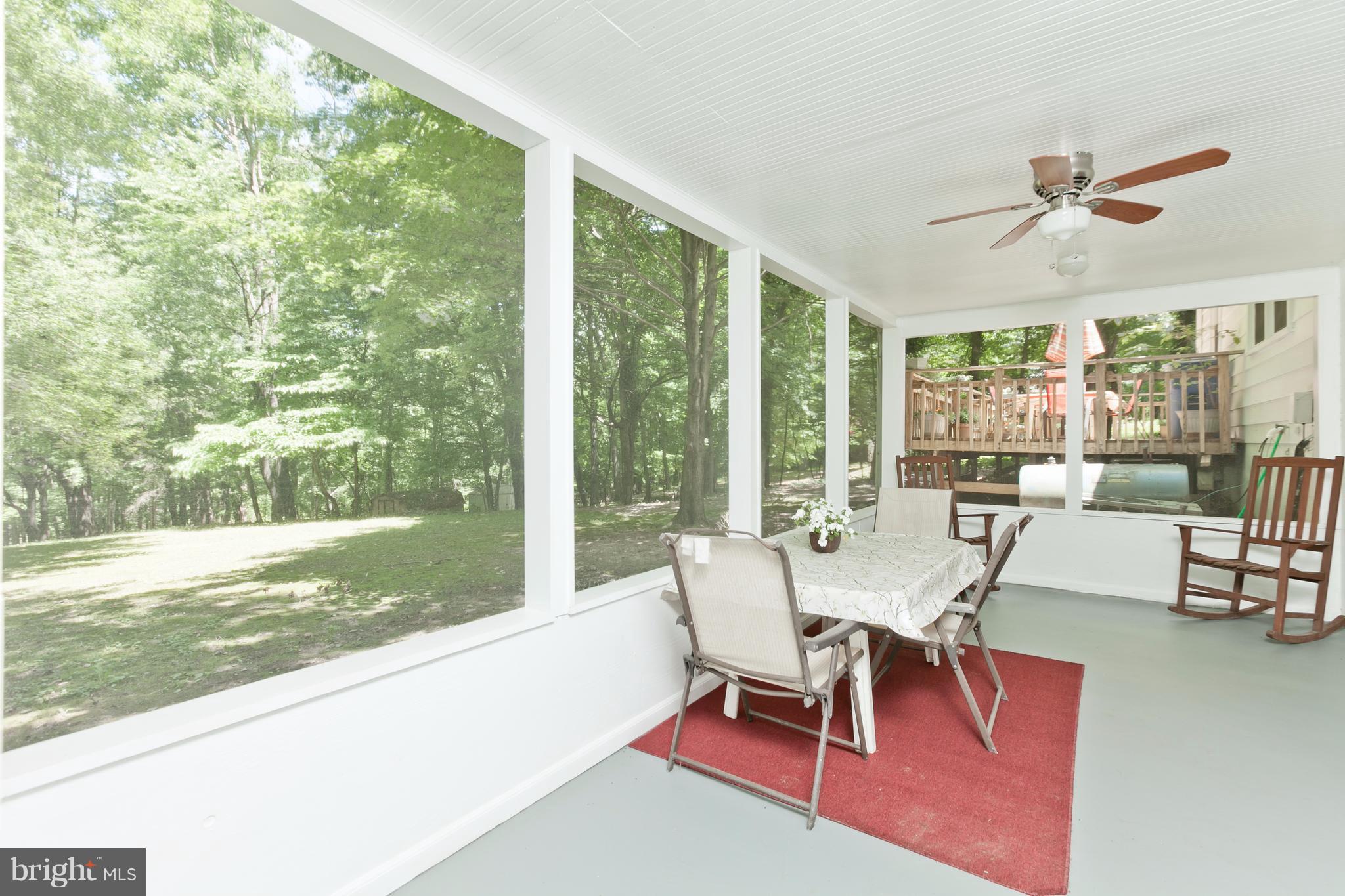 10117 Clearspring Road Damascus, MD 20872 - Photo 25 of 30 Screened porch overlooking amazing yard