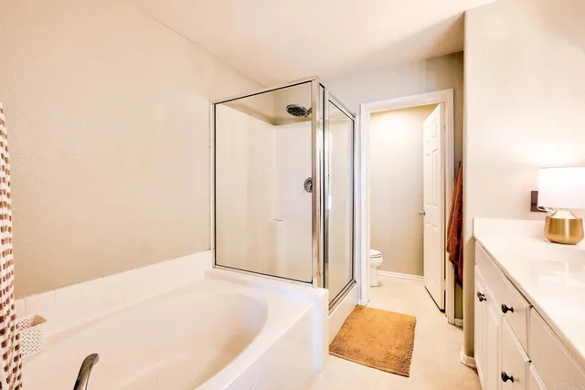 a view of a balcony with wooden floor