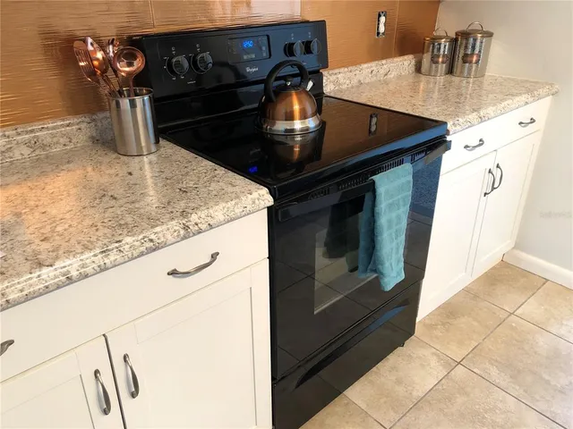 a bathroom with a sink toilet and a mirror