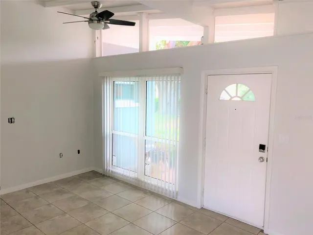 a kitchen with a sink cabinets and stainless steel appliances