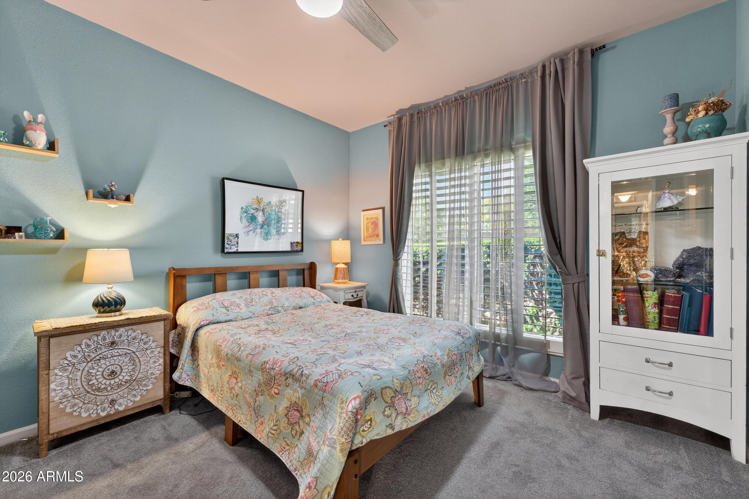 1539 East Winged Foot Road Phoenix, AZ 85022 - Photo 41 of 64 a bedroom with a bed and a window