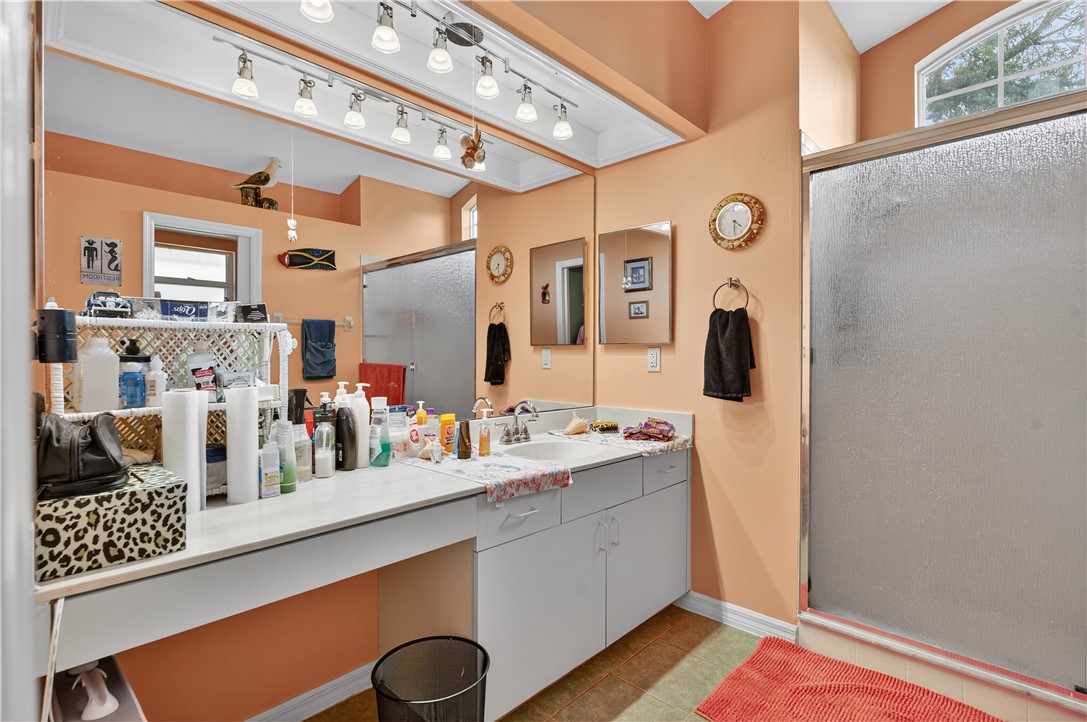 1361 Clearbrook Street Sebastian, FL 32958 - Photo 19 of 29 a bathroom with a sink mirror and vanity