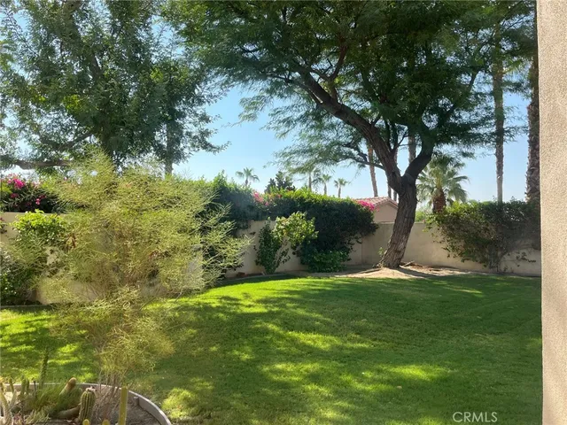 a view of a street with a building in the background
