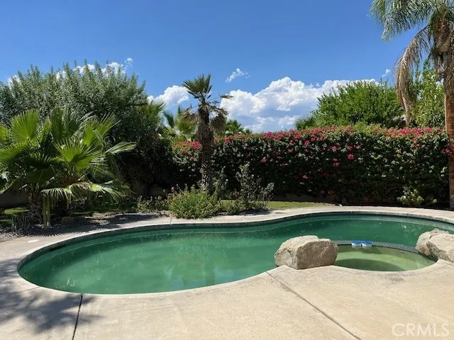 a view of a house with a garden