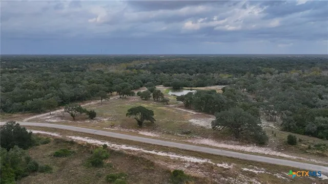 a view of a field with beach