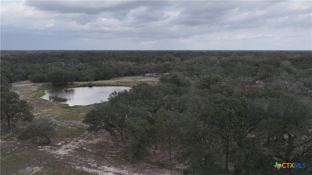 0 Garcitas Crk Rnch Road Inez, TX 77968 - Photo 7 of 13 a view of a dry yard with wooden fence