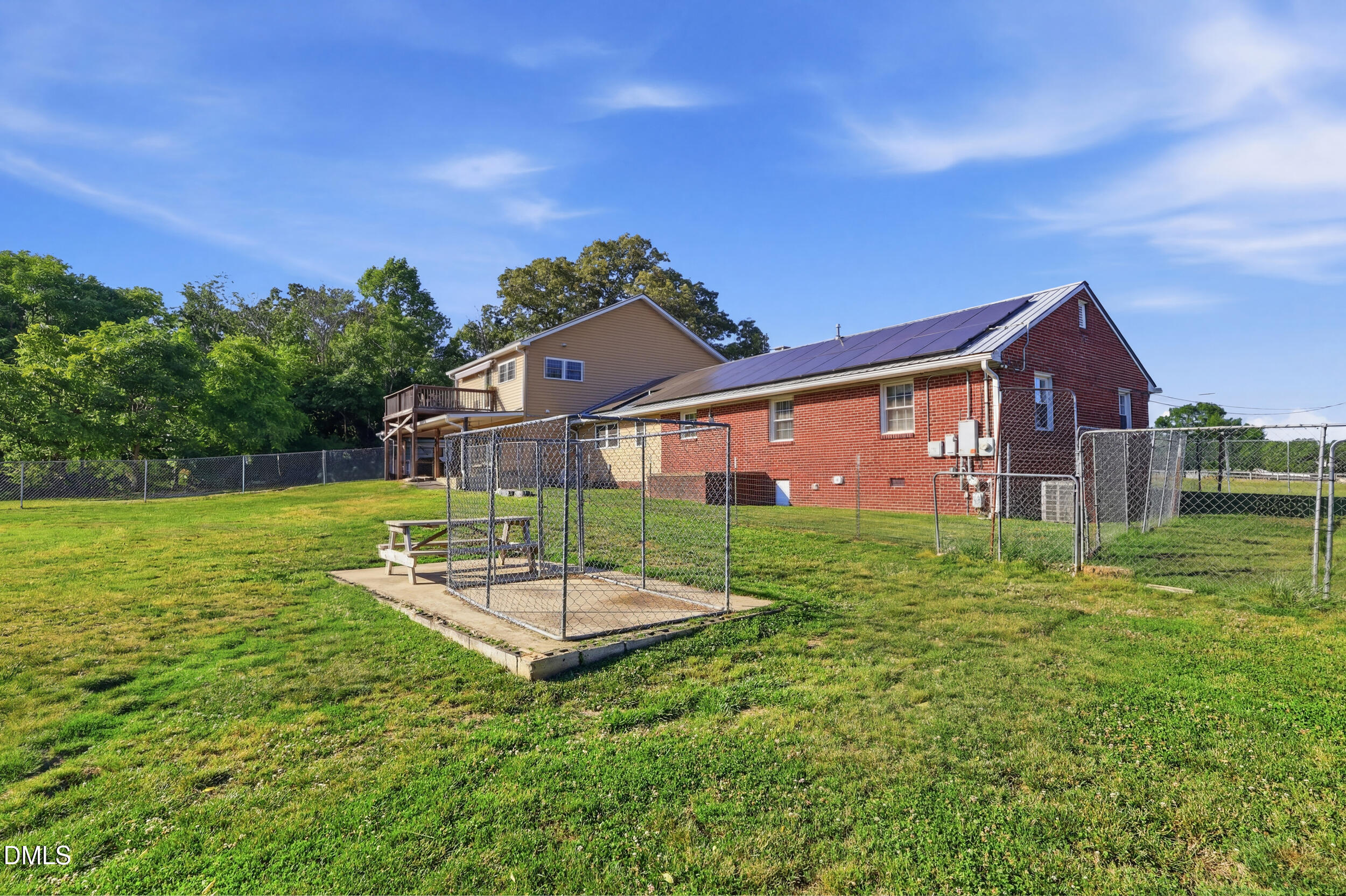 2631 South Jim Minor Road Haw River, NC 27258 - Photo 43 of 62 a front view of a house with garden