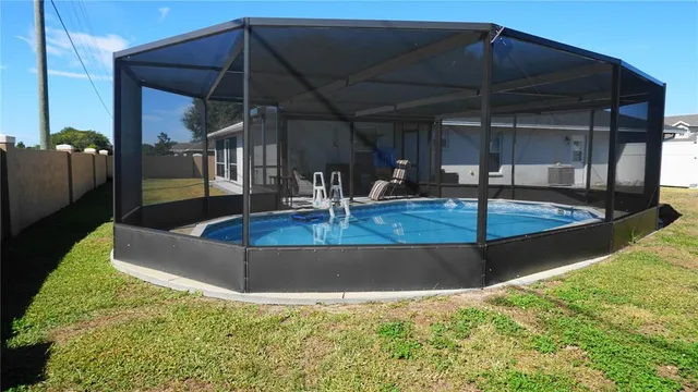 a view of a backyard of a house