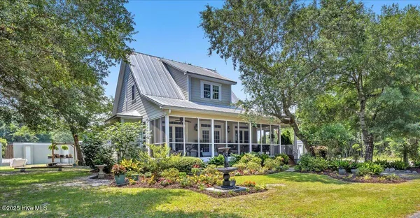 $459,900 | 705 Cypress Lakes Circle Southeast, Bolivia, NC 28422