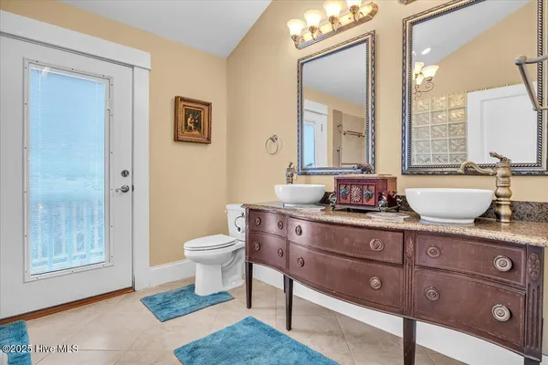 $459,900 | 705 Cypress Lakes Circle Southeast, Bolivia, NC 28422