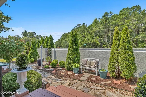 $459,900 | 705 Cypress Lakes Circle Southeast, Bolivia, NC 28422