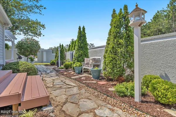 $459,900 | 705 Cypress Lakes Circle Southeast, Bolivia, NC 28422