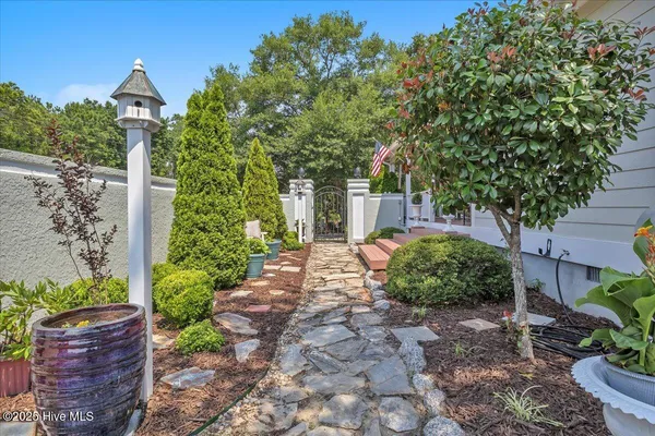 $459,900 | 705 Cypress Lakes Circle Southeast, Bolivia, NC 28422