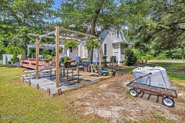 $459,900 | 705 Cypress Lakes Circle Southeast, Bolivia, NC 28422