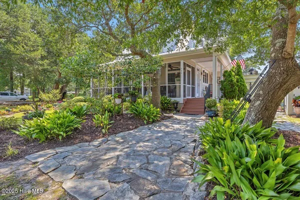 $459,900 | 705 Cypress Lakes Circle Southeast, Bolivia, NC 28422