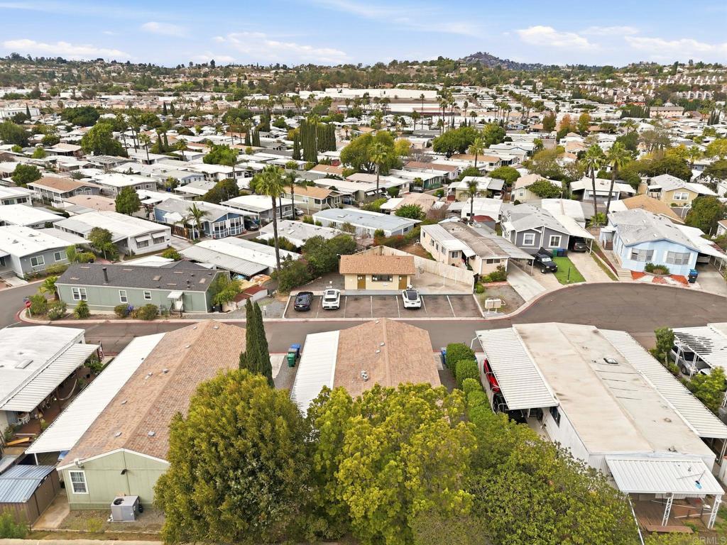 10767 Jamacha Boulevard, Unit SPC 119 Spring Valley, CA 91978 - Photo 23 of 25 an aerial view of residential houses with outdoor space