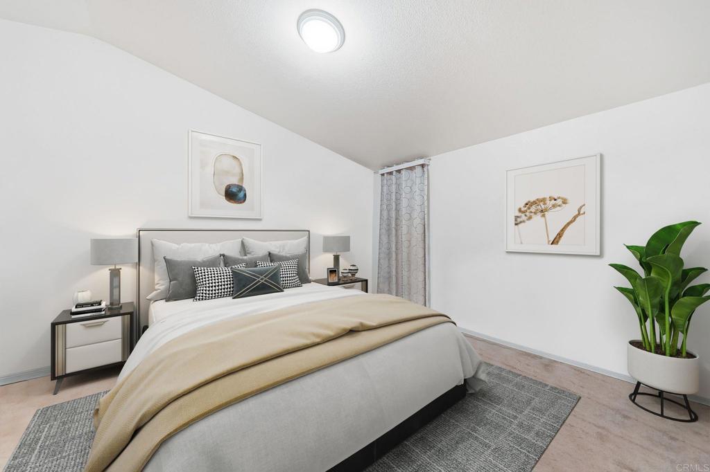 10767 Jamacha Boulevard, Unit SPC 119 Spring Valley, CA 91978 - Photo 5 of 25 a bedroom with bed and painting on the wall