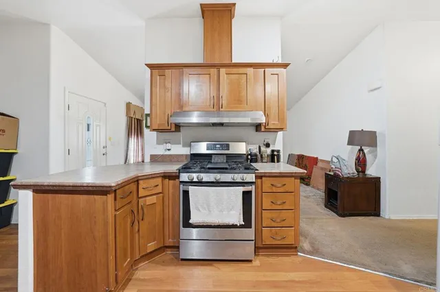 a kitchen with a stove and a sink