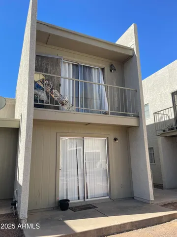 a front view of a house with street view