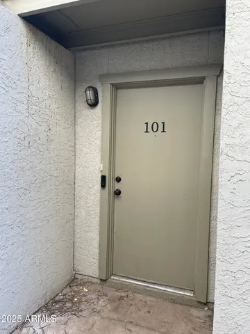 a front view of a house with a garage