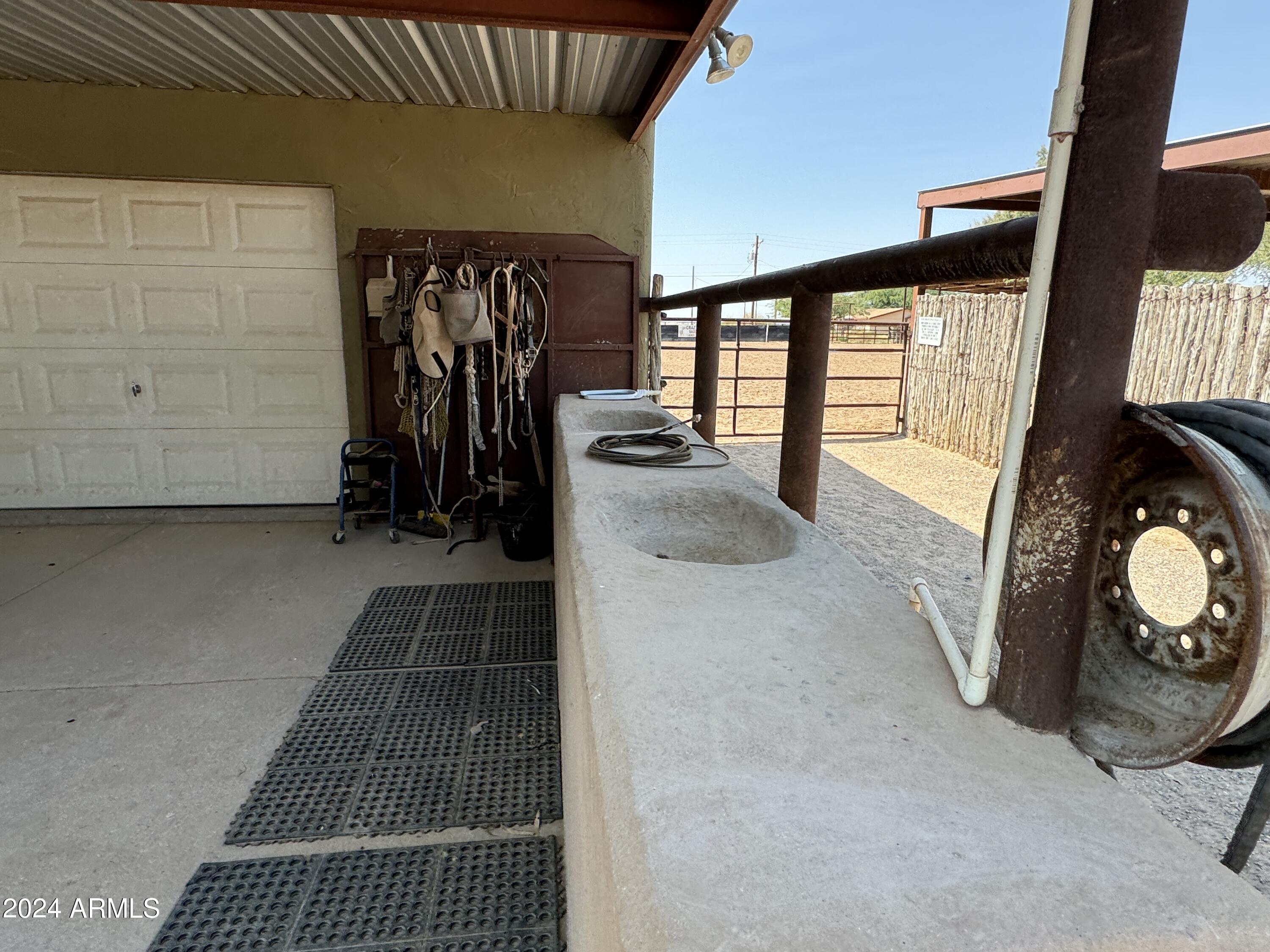 642 East Cornman Road Coolidge, AZ 85128 - Photo 30 of 63 a view of a livingroom with storage and utility