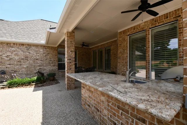 a view of backyard with cabin