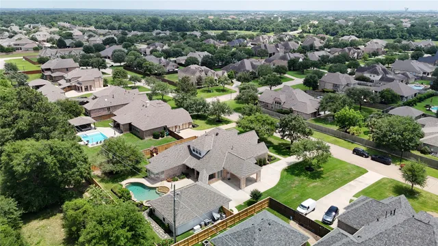 an aerial view of residential house with outdoor space