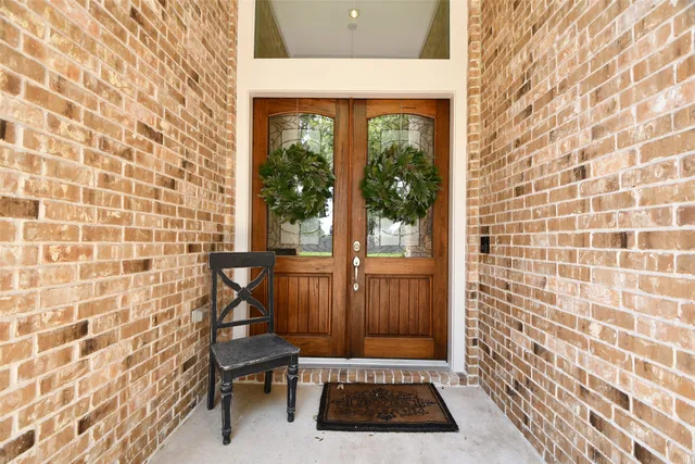 a bathroom with a toilet a sink and a shower